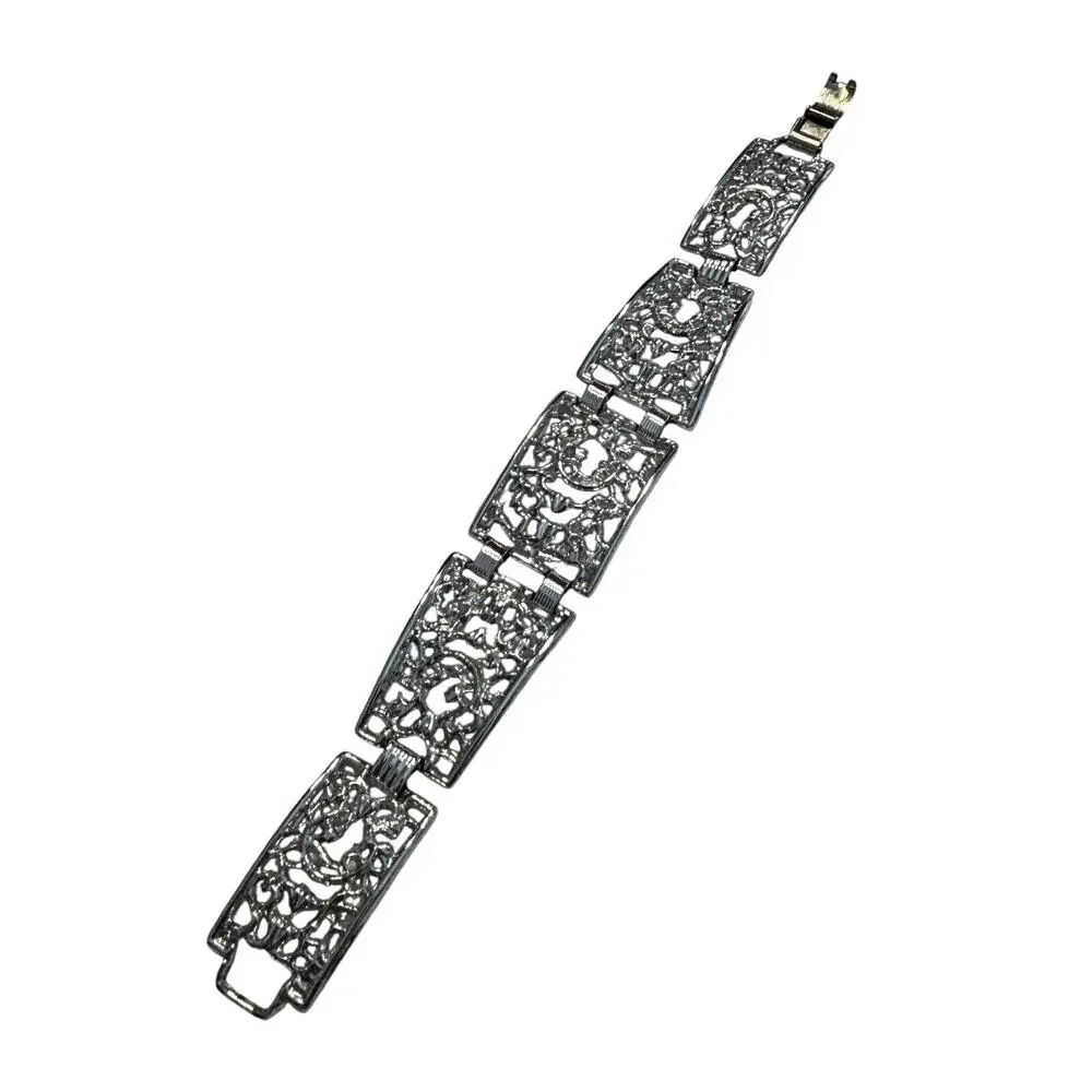 Vintage silver tone filigree chain bracelet hallmarked SAC tapered panel links
